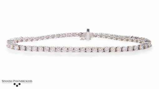 pre-owned Platinum Diamond tennis bracelet with 5.5 carats of round brilliant cut diamond