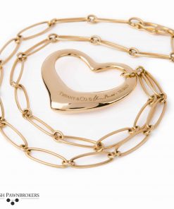 pre-owned Tiffany & Co Open heart pendant on a necklace singed Elsa Peretti made of 18-carat yellow gold