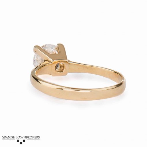 Pre-owned ladies Diamond solitaire set with a 1.12 carat round brilliant cut diamond made of 18-carat yellow gold