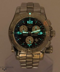 Second hand luxury watch Breitling Emergency Mission A73321 under black light